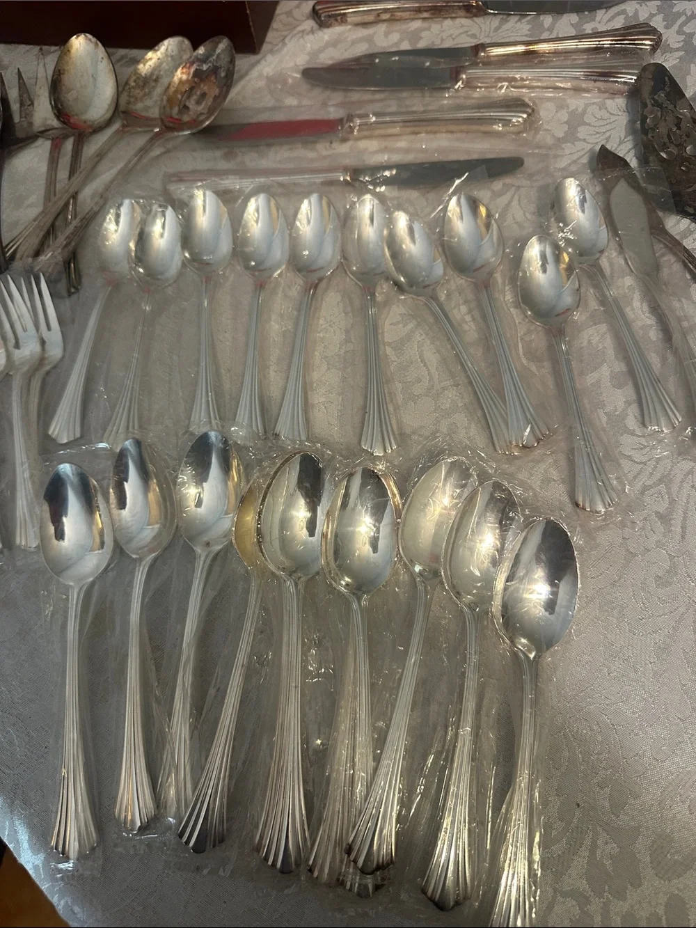 Classic Silver-Plated Flatware Set in Red Velvet Case. Used and factory sealed.